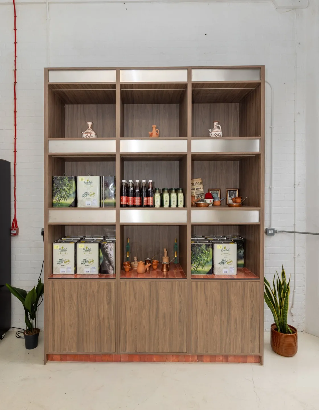 Bespoke shelving unit walnut display retail products — Dalston