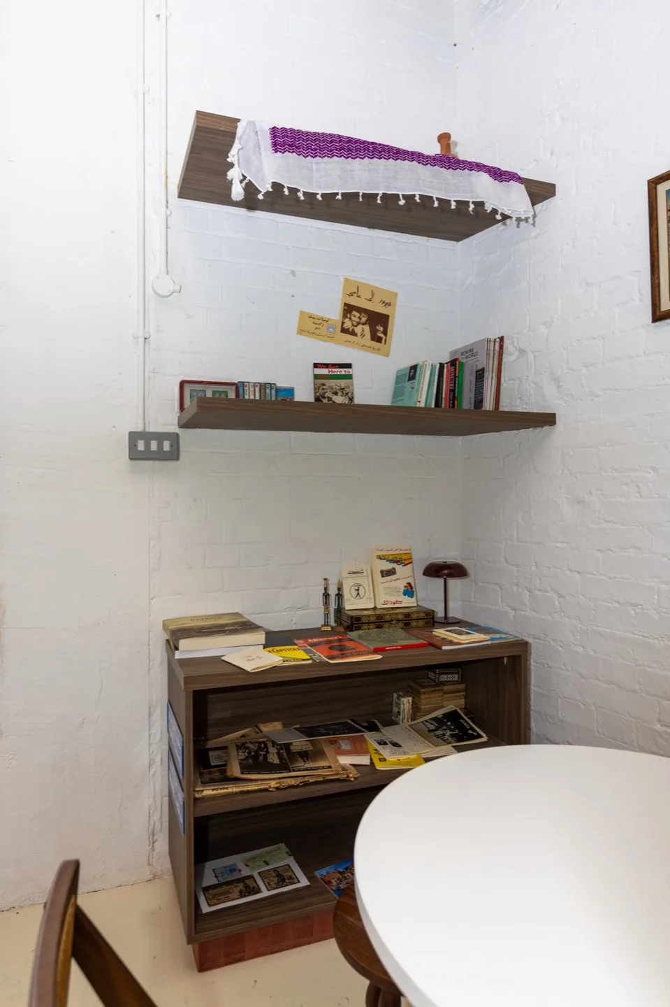 Bespoke shelving unit walnut wall shelves reading nook — Dalston