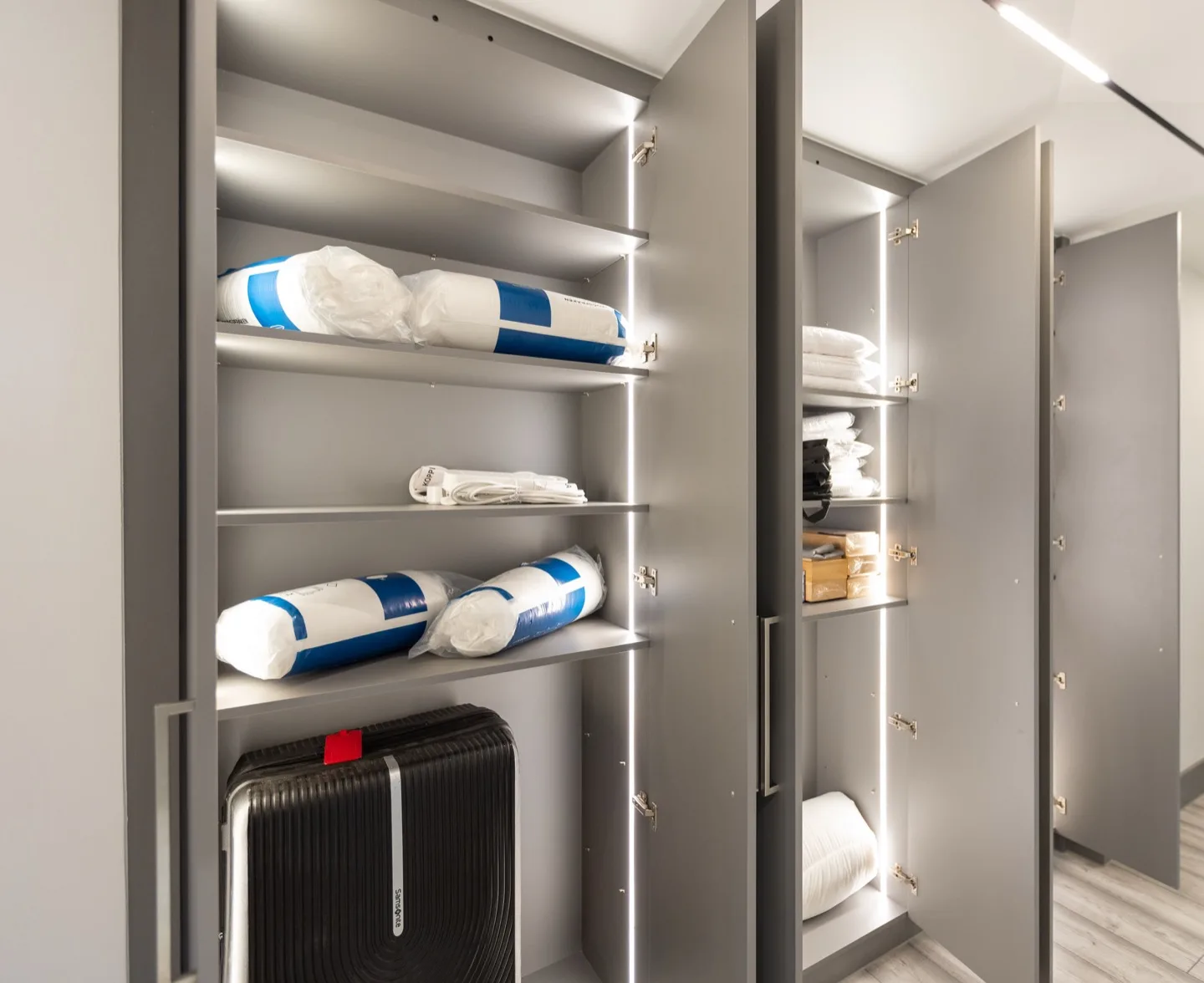 Bespoke fitted wardrobe led storage shelves open — Kensington
