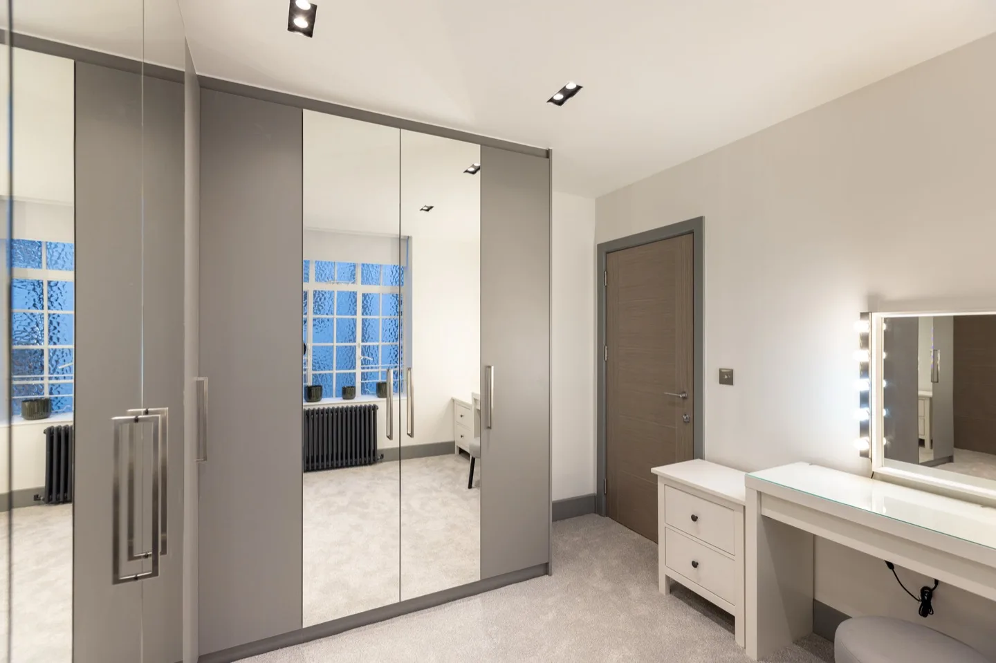 Walk wardrobe grey panel mirrored doors — Kensington