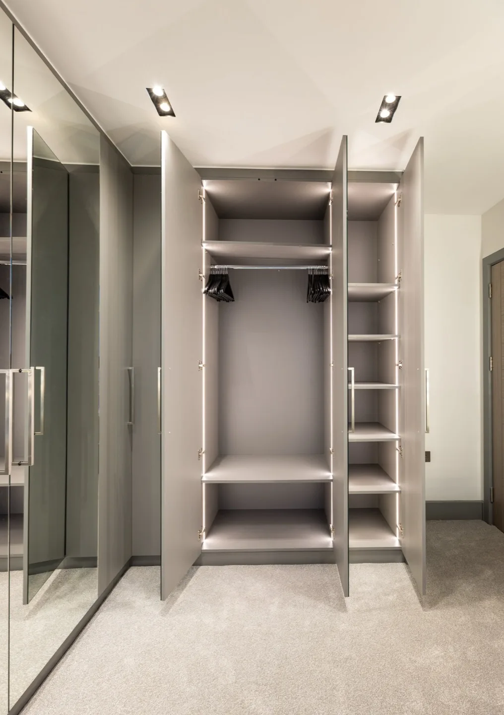Walk wardrobe led lit interior shelves rails — Kensington