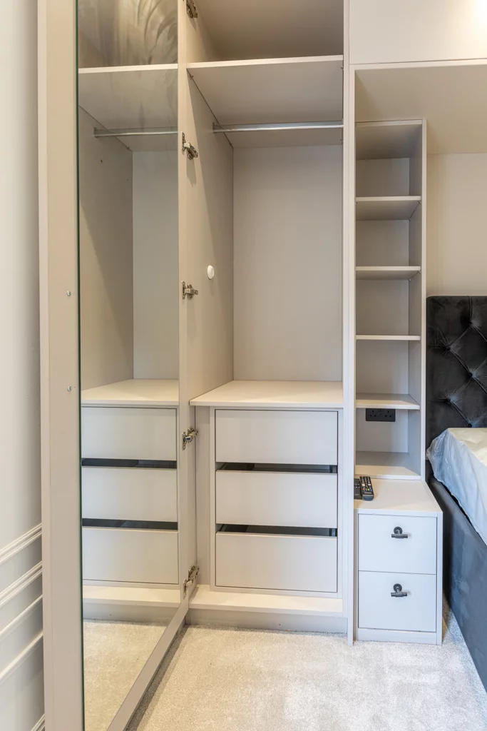 Open white wood wardrobe