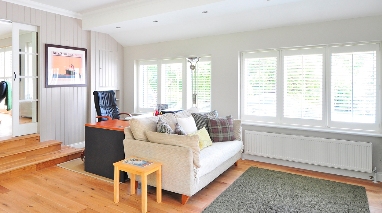 living room with desk.
