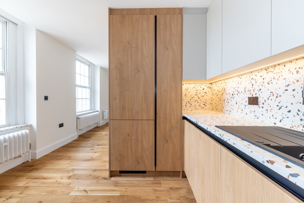 kitchen counter with kitchen cabinets